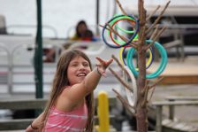A girl playing with hoops